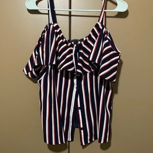 It’s a very pretty shirt for the summer it’s a red and white with black